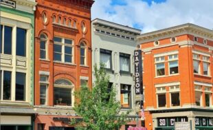Buildings in Downtown Glens Falls with a blue sky